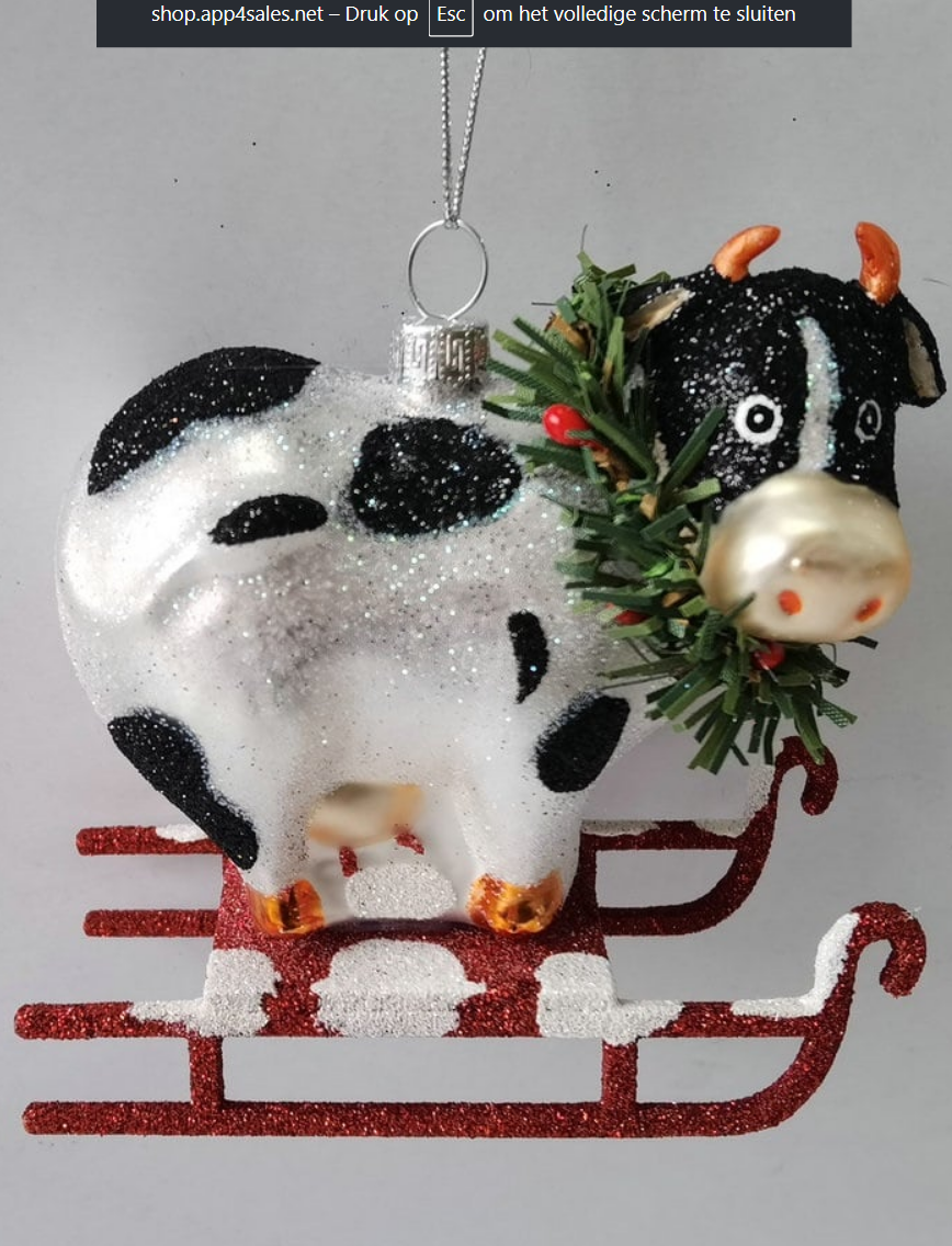 Kerstbal koe op de slee